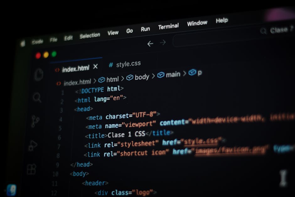A computer screen displays a code editor with HTML and CSS code visible. The code includes tags such as <html>, <head>, <title>, and <link>, indicating website development related to styling and layou
